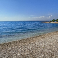Beach in front of Velaris with Maestral Travel Agency